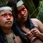 Indigenous Waorani girls in the Amazon Rainforest.
