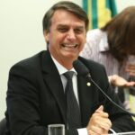 Jair Bolsonaro smiling